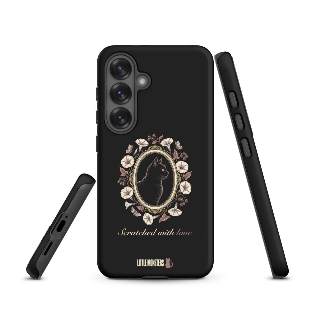 Black tough Samsung Galaxy case, front and side views, with a black cat in a gold cameo framed by moonflowers and Scratched with love in script