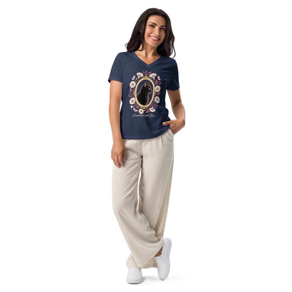 Printful model wearing navy Scratched with Love V-neck with cream script