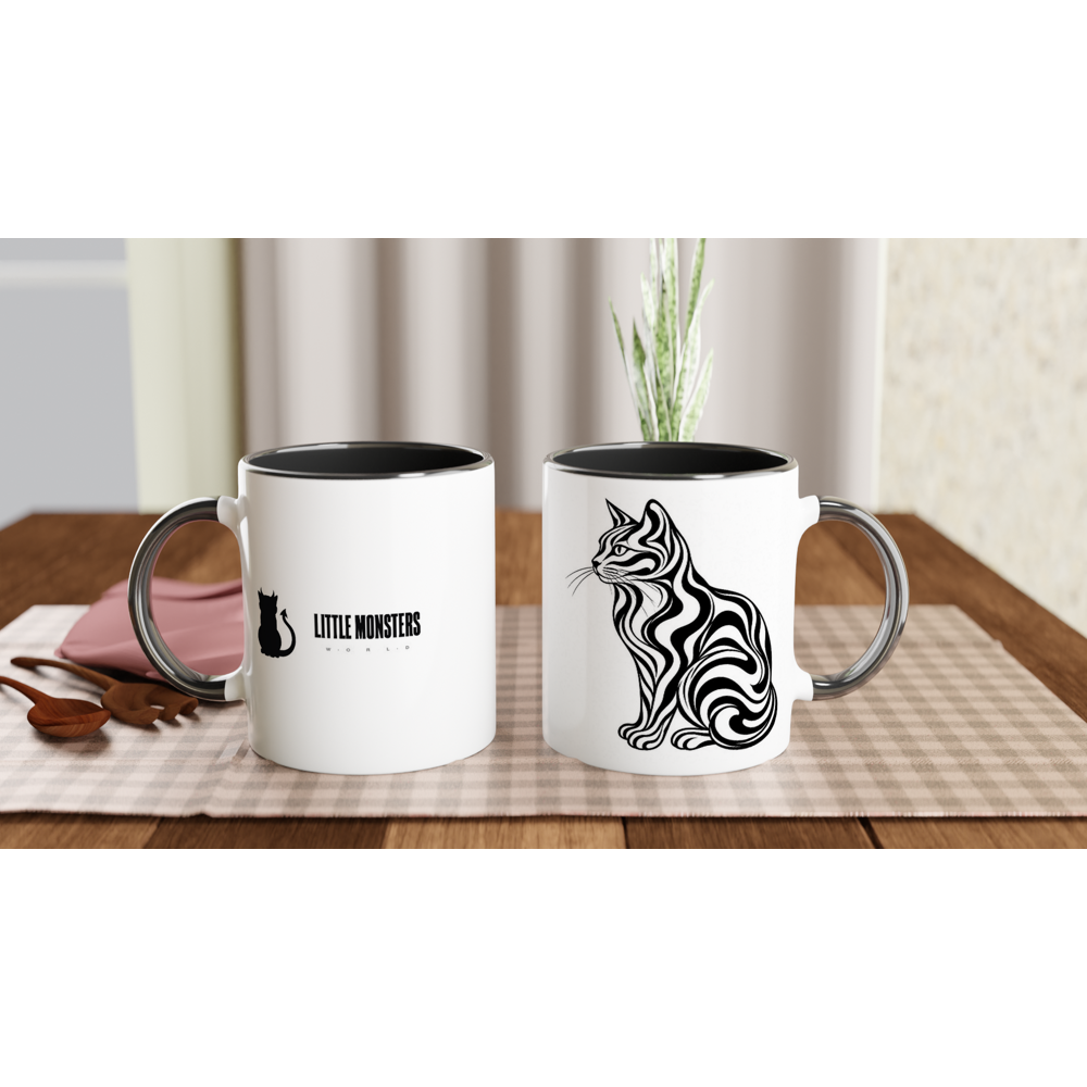 Two Little Monsters ceramic mugs on a table, one showing the monster art and one showing the Little Monsters World lockup